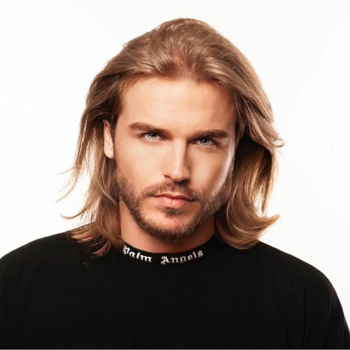 Artist picture of Tuslay