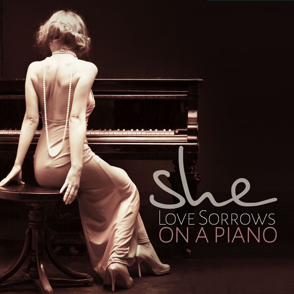 Album cover of She: Love Sorrows on a Piano