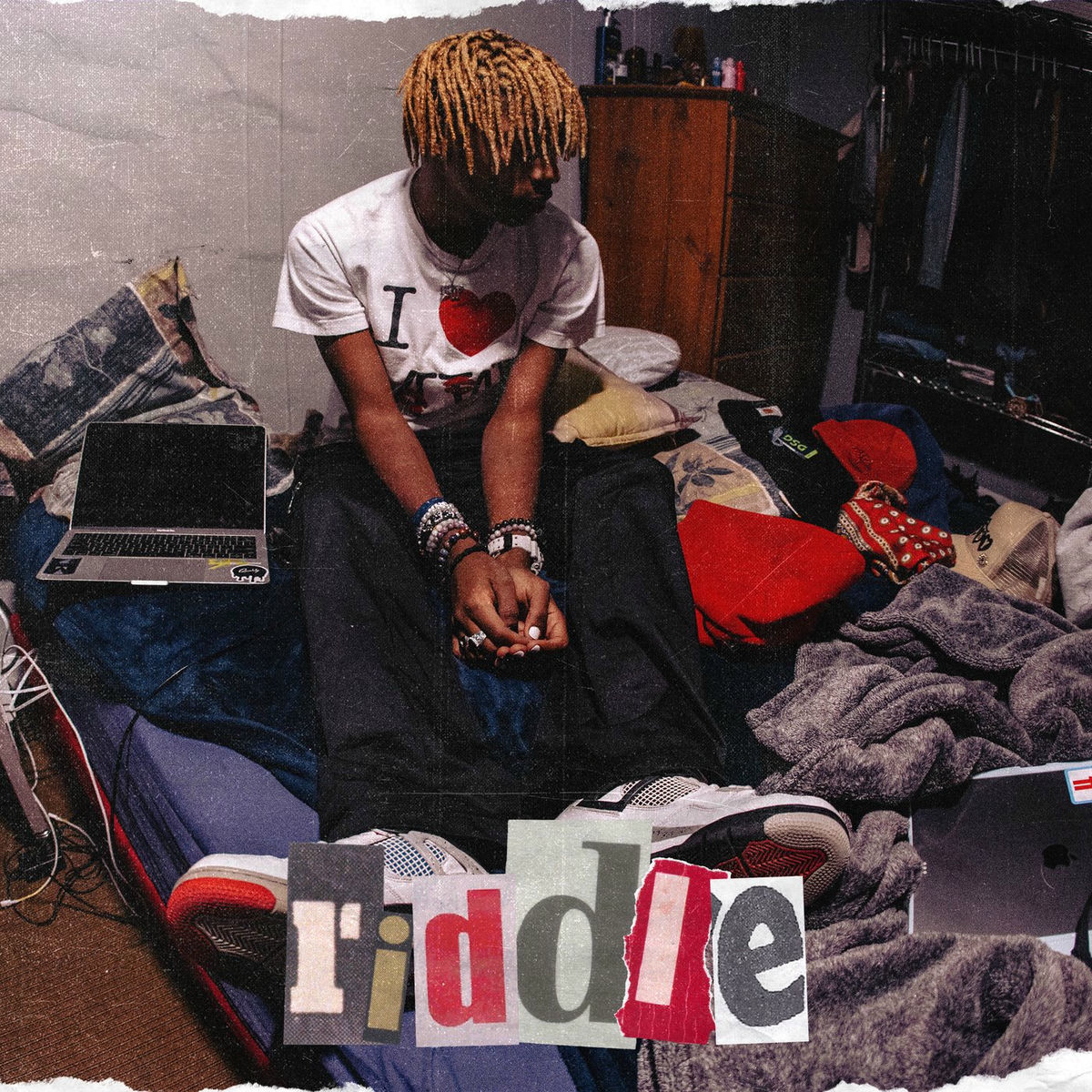 Album cover of riddle