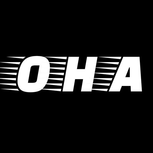 Она
