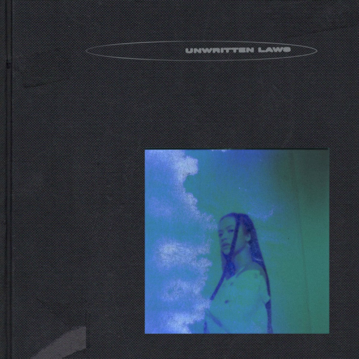 Album cover of Unwritten Laws