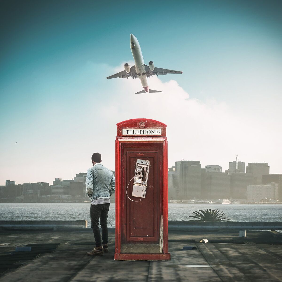 Standing outside a broken phone booth discount