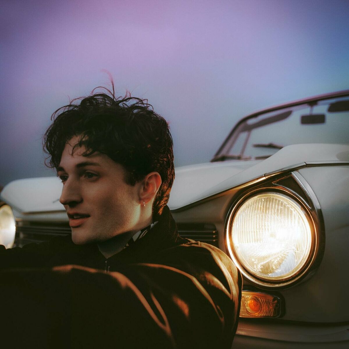 Album cover of beat up car
