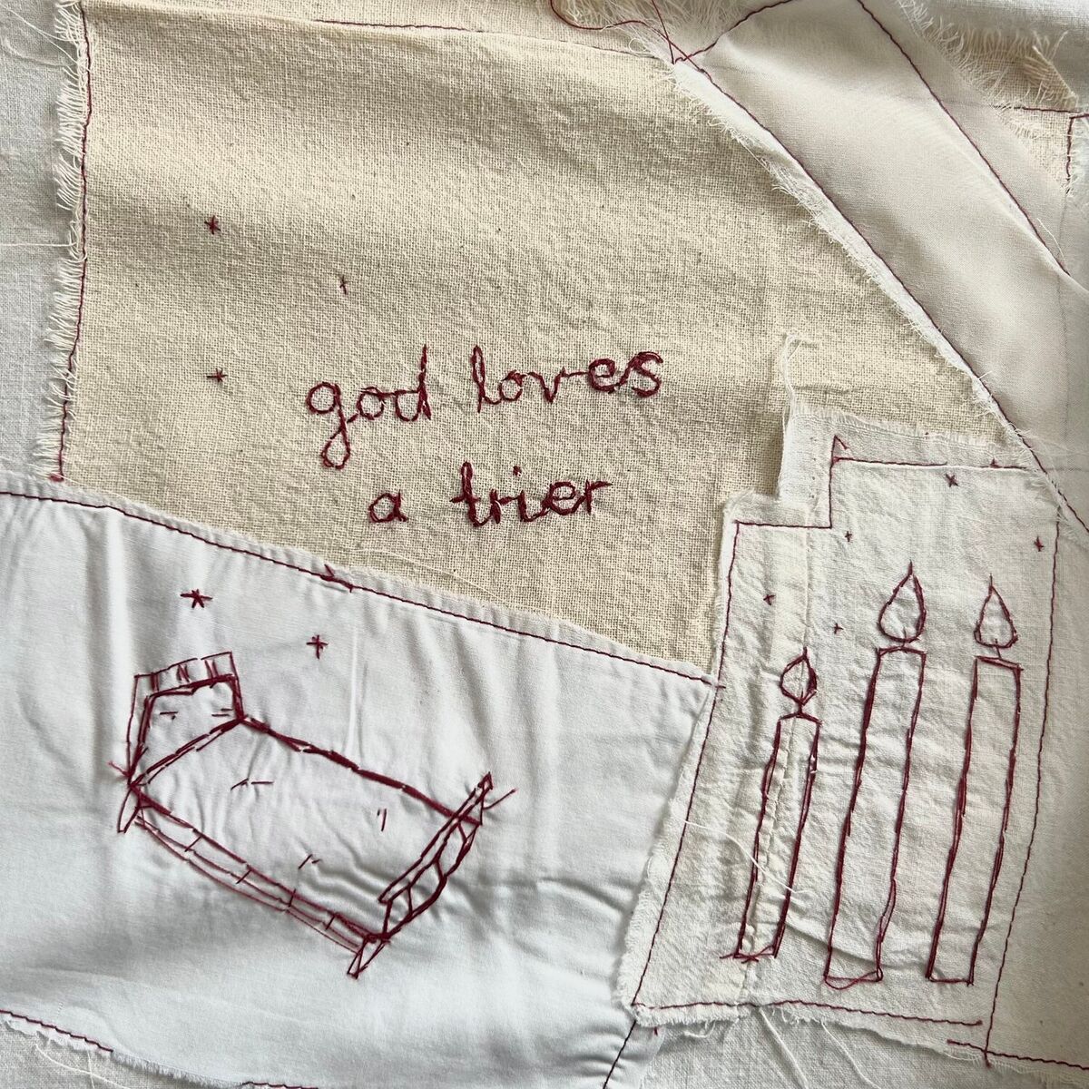 Album cover of god loves a trier