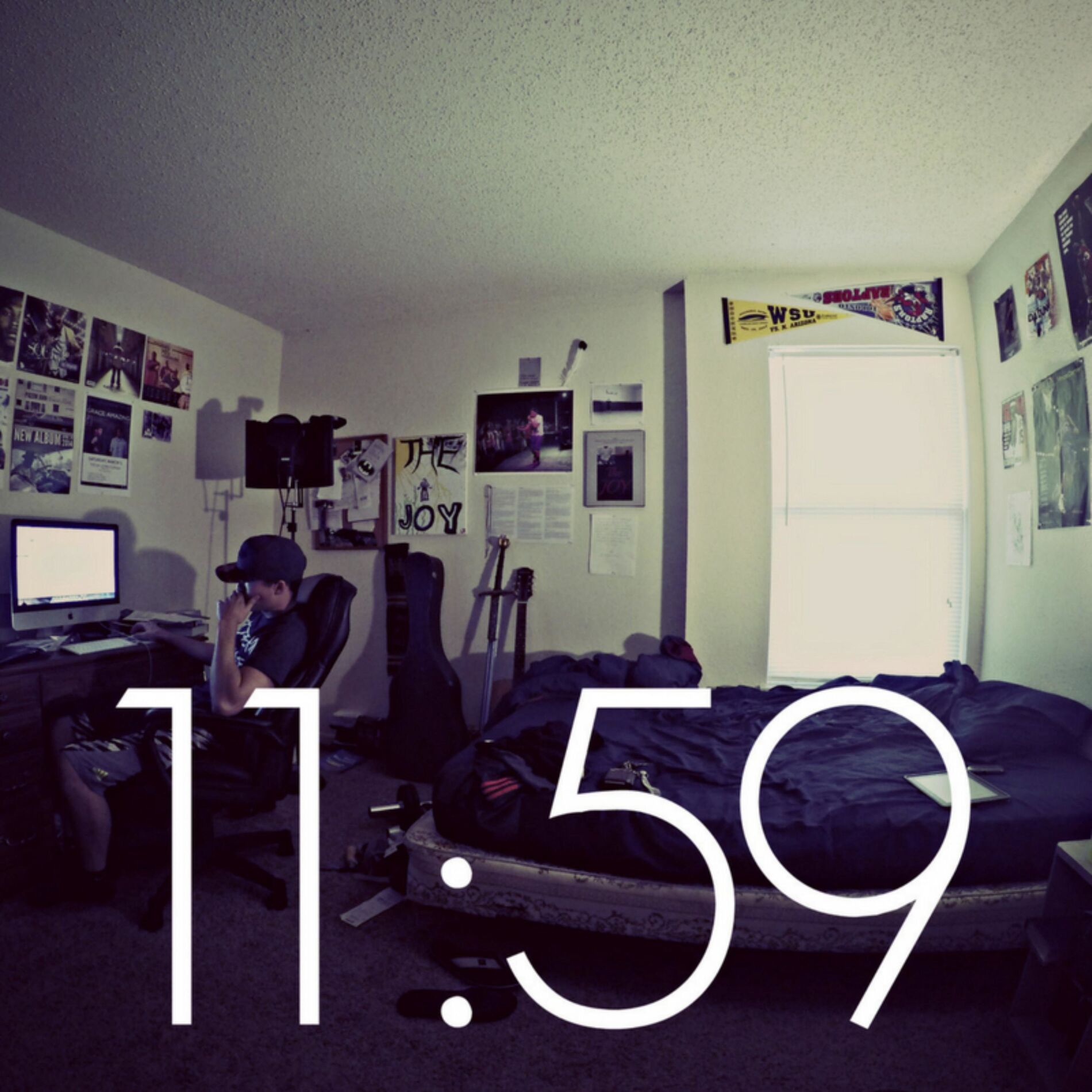 Album cover of 11:59