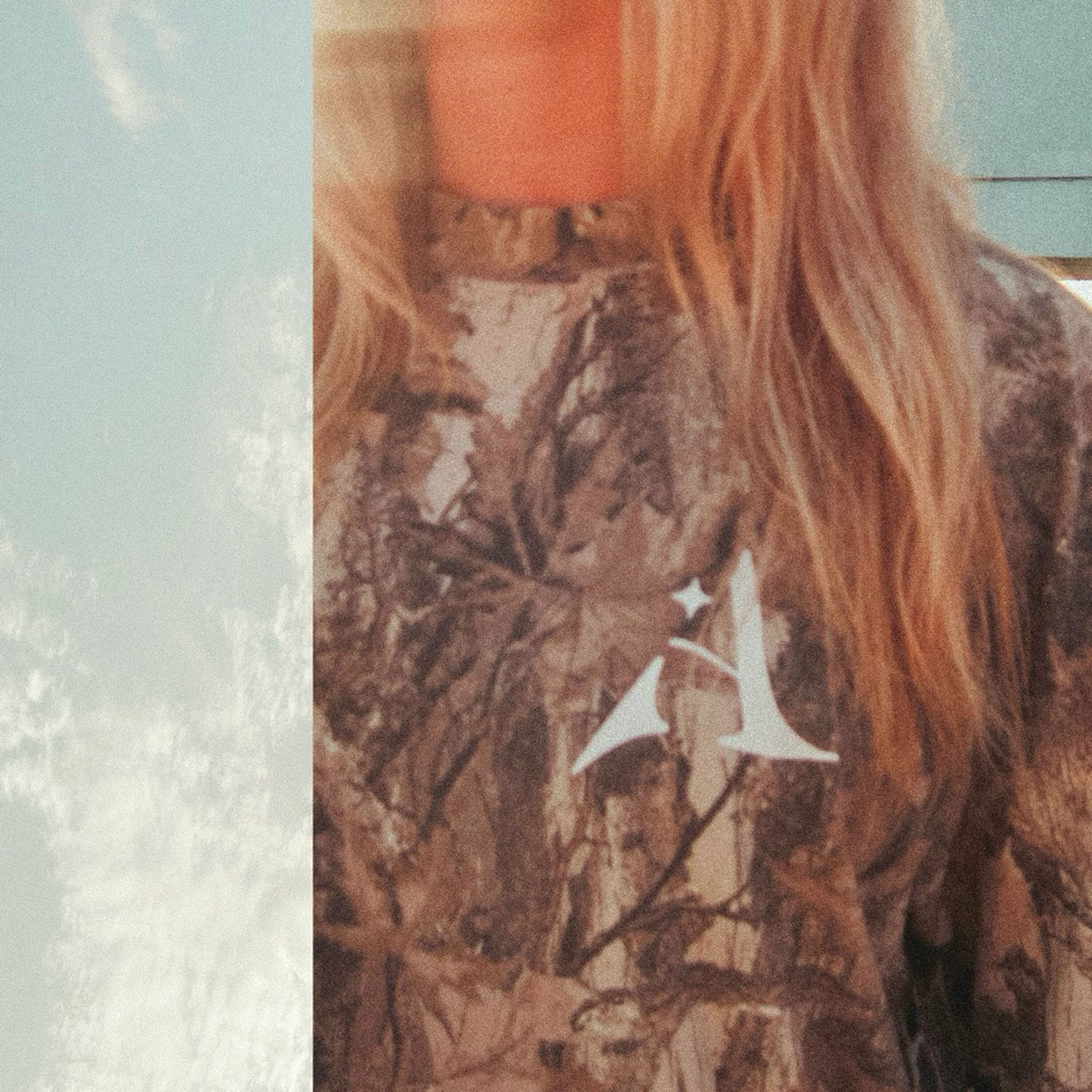 Album cover of baggy t-shirt