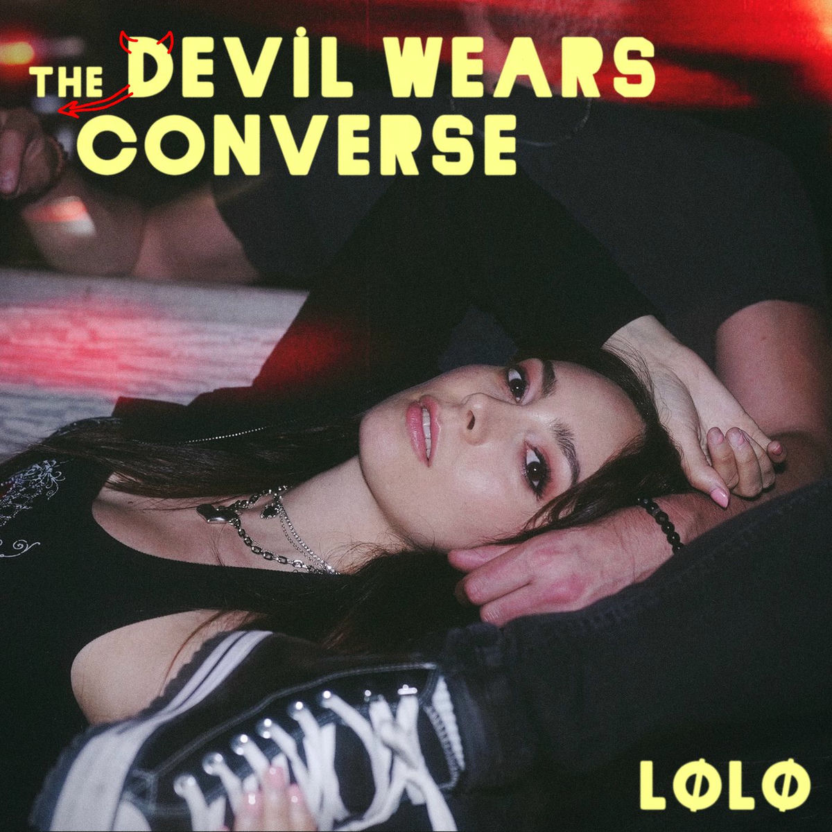 Album cover of the devil wears converse