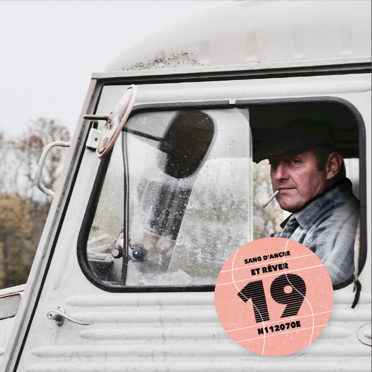 Album cover of Couché dans une brouette