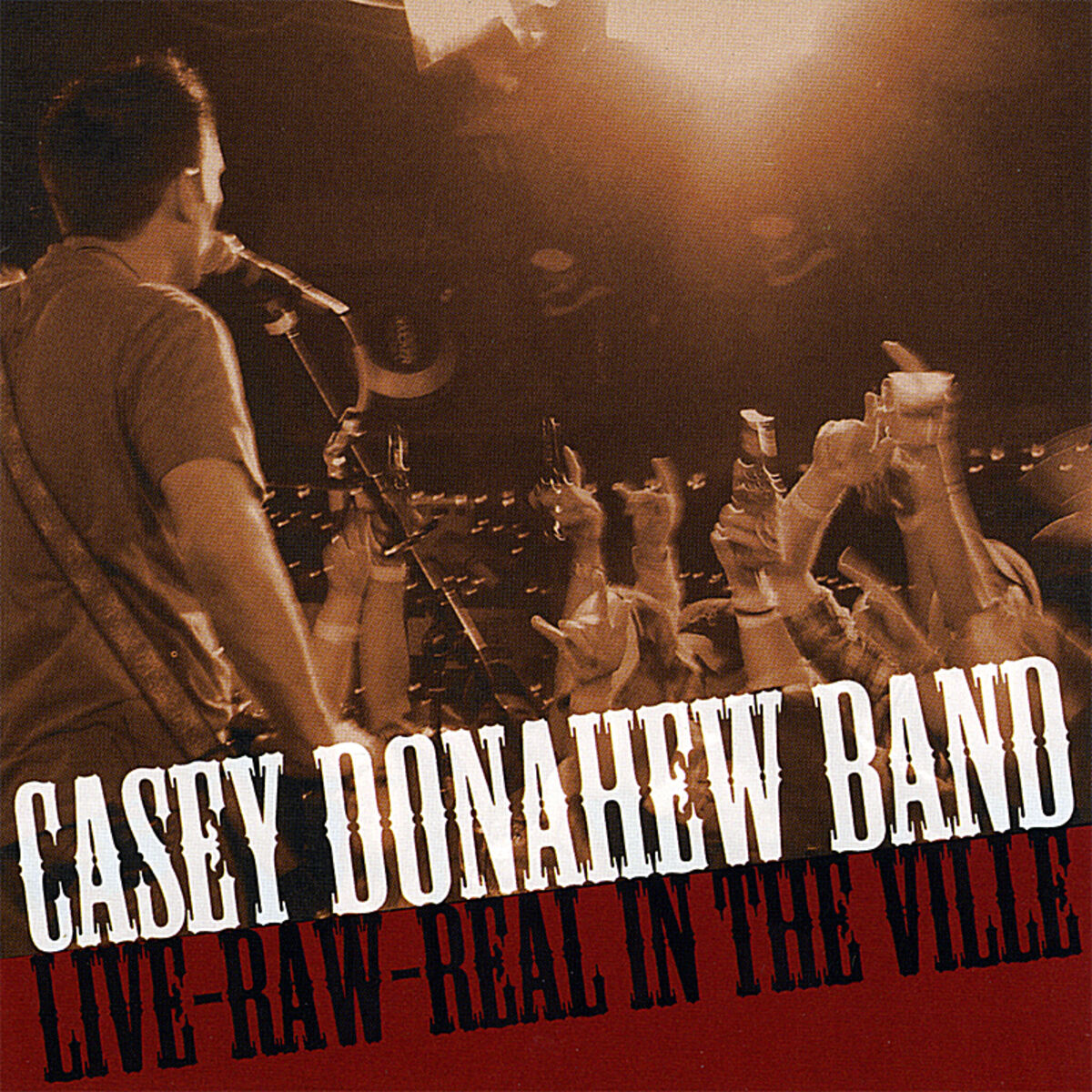 Album cover of Live-raw-real, In The Ville