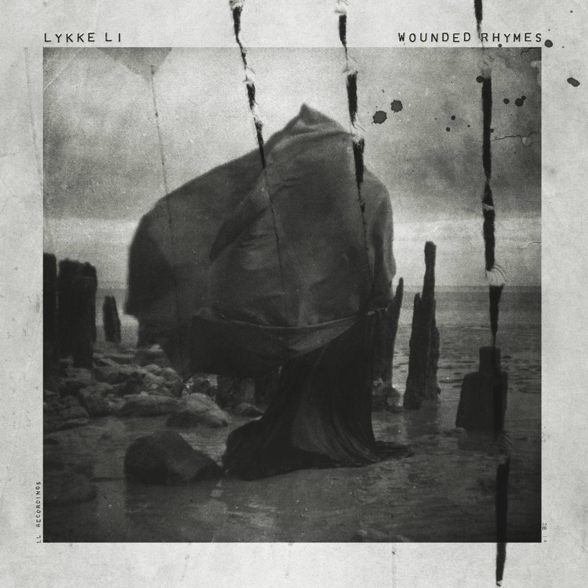 Album cover of Wounded Rhymes (Bonus Version)