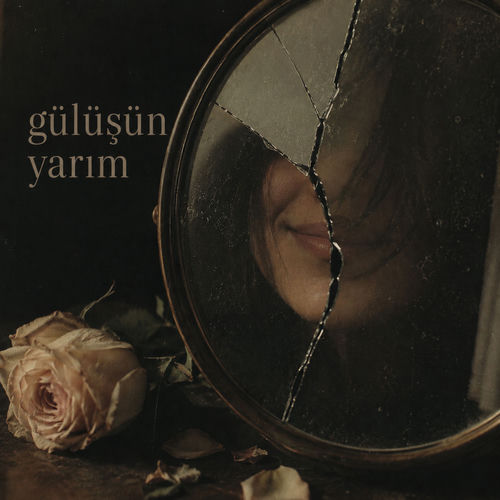 gülüşün yarım