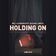 Holding On