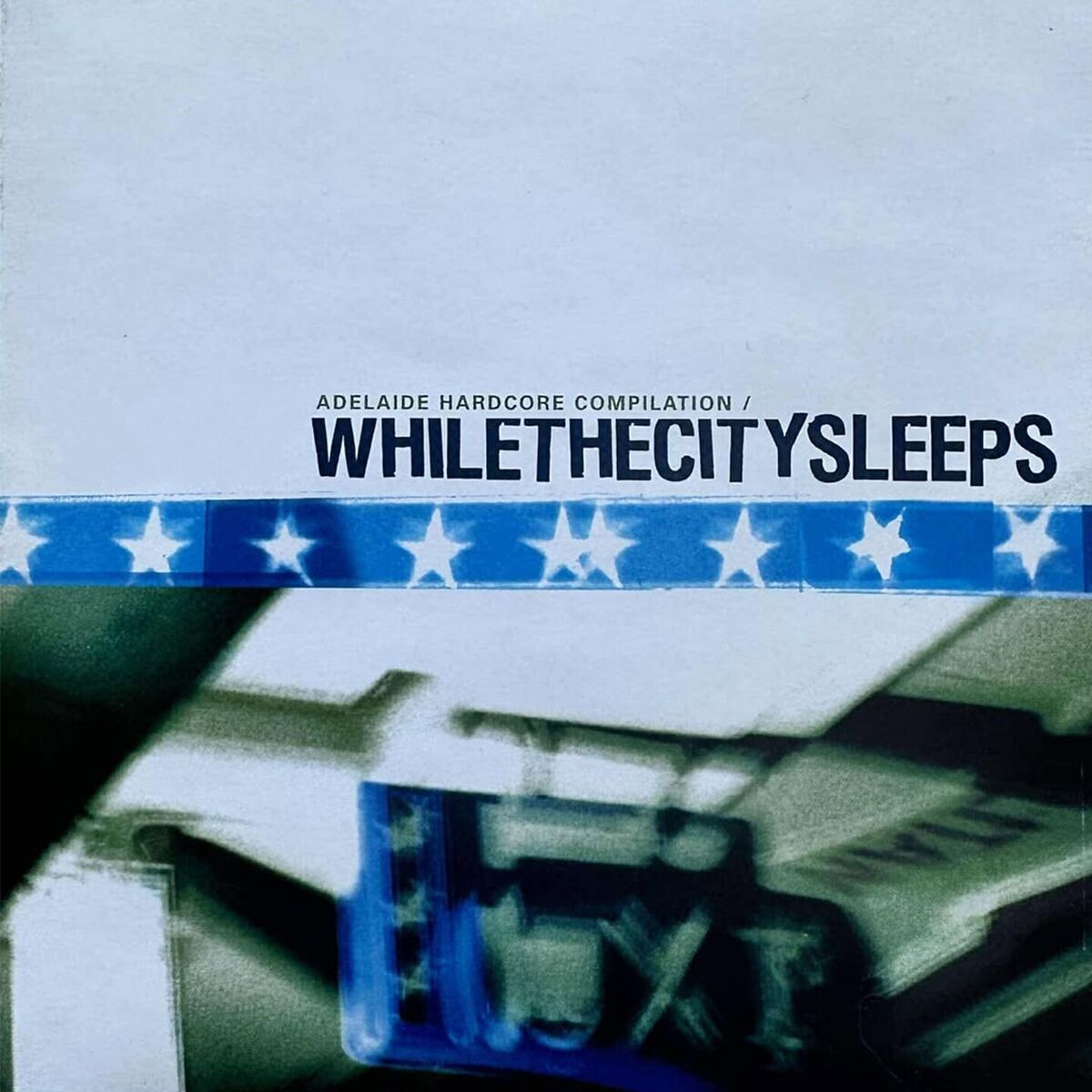 Album cover of While The City Sleeps