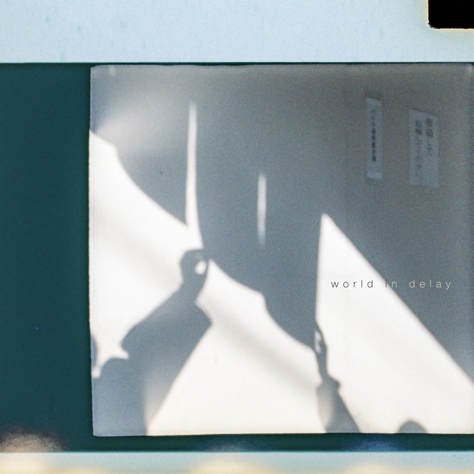 Album cover of world in delay