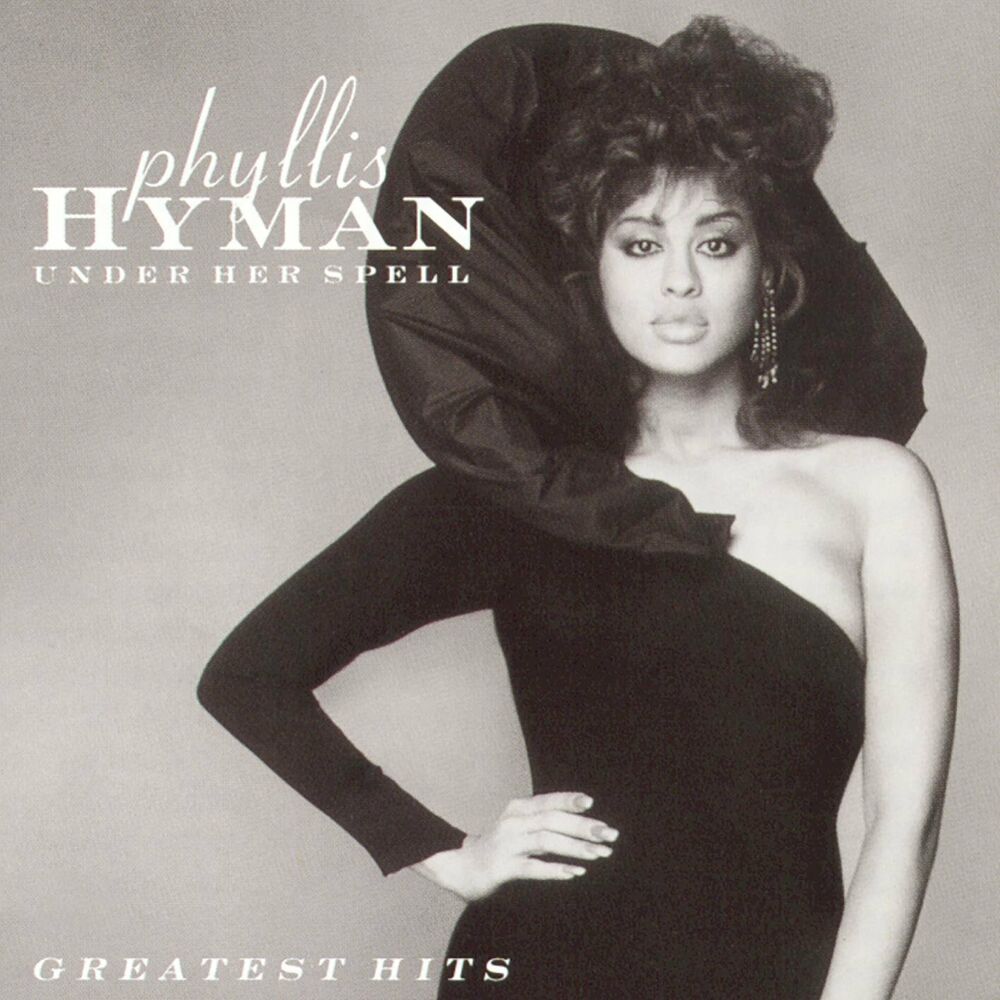 Picture of Under Her Spell - Greatest Hits