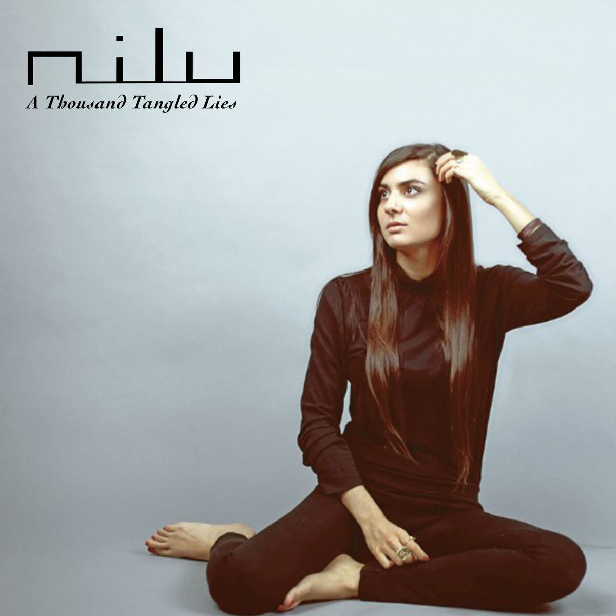 Album cover of A Thousand Tangled Lies